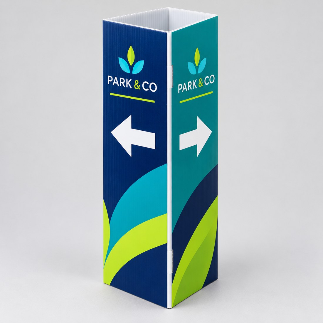Freestanding triangular slip-on bollard sign cover with an open top and directional arrows